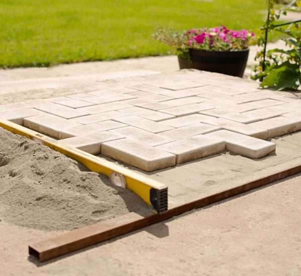 paving-stone-diy-pave-pavement-bricklayer-men-working-outdoor-slab-job-cottagecore-real-people-garden_t20_6YGjwN