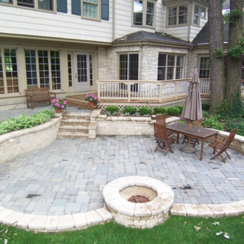 Heart Shaped Stone Patio with Wood Deck
